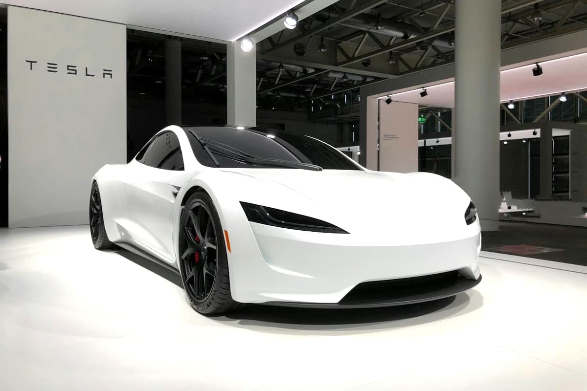 Modern connected electric vehicle testing in bright daylight engineering facility