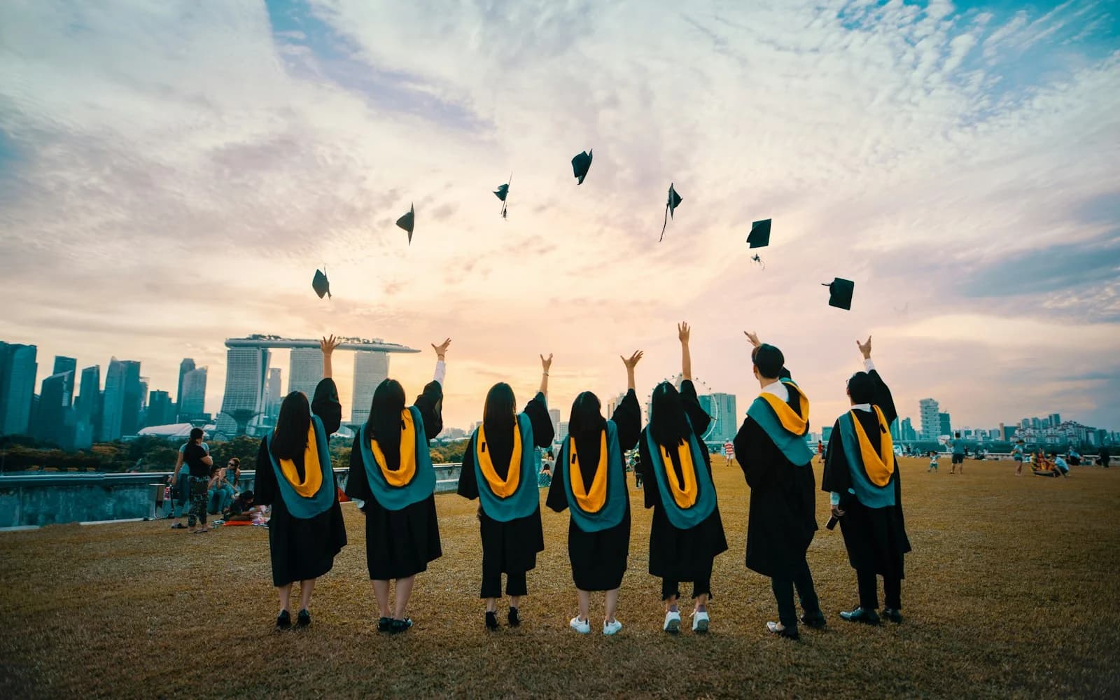 Bright sunlit modern university campus architecture with students and faculty in clean daylight setting